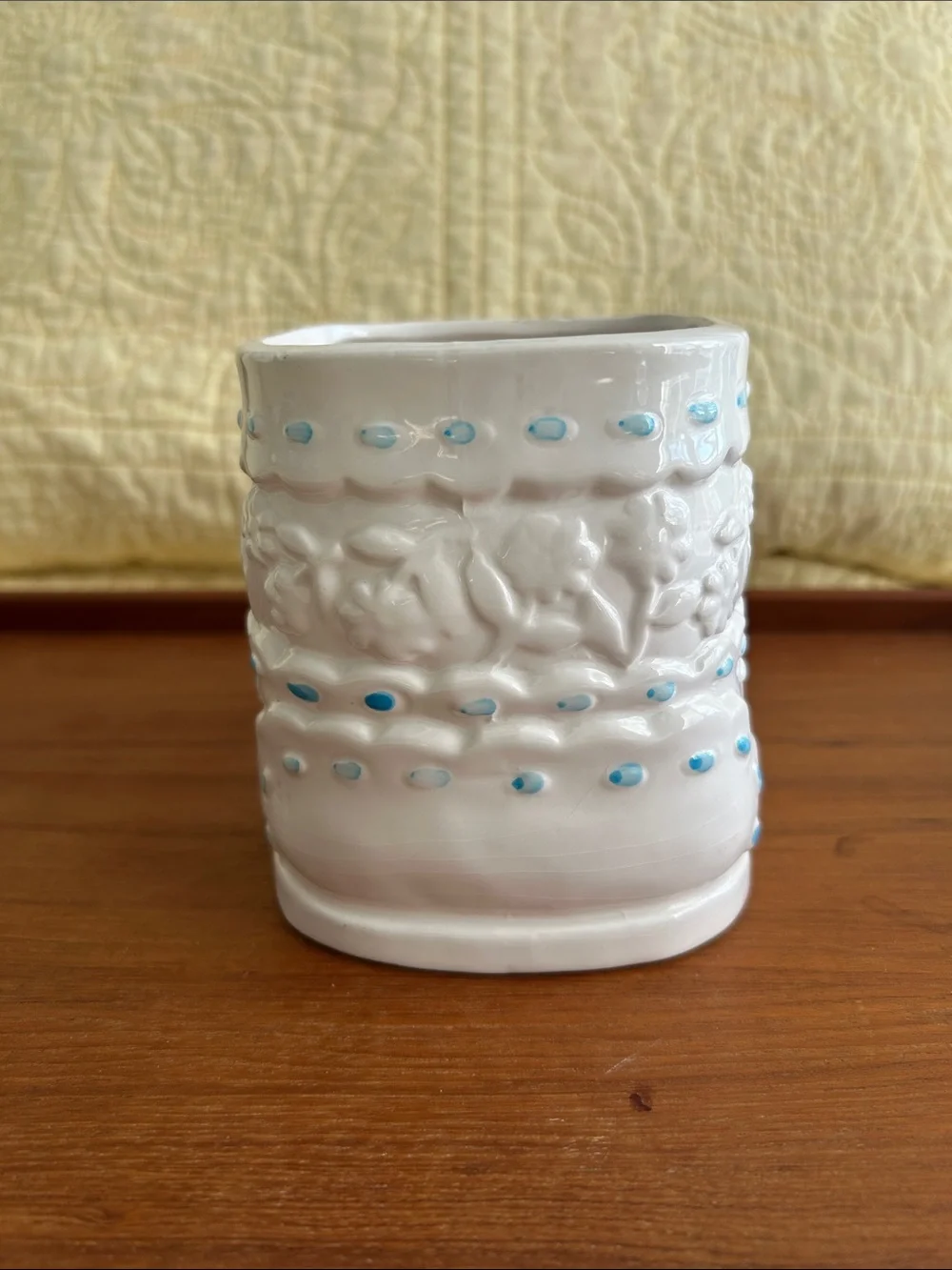 Vintage Ceramic baby bootie planter Embossed floral design and turquoise ribbon.